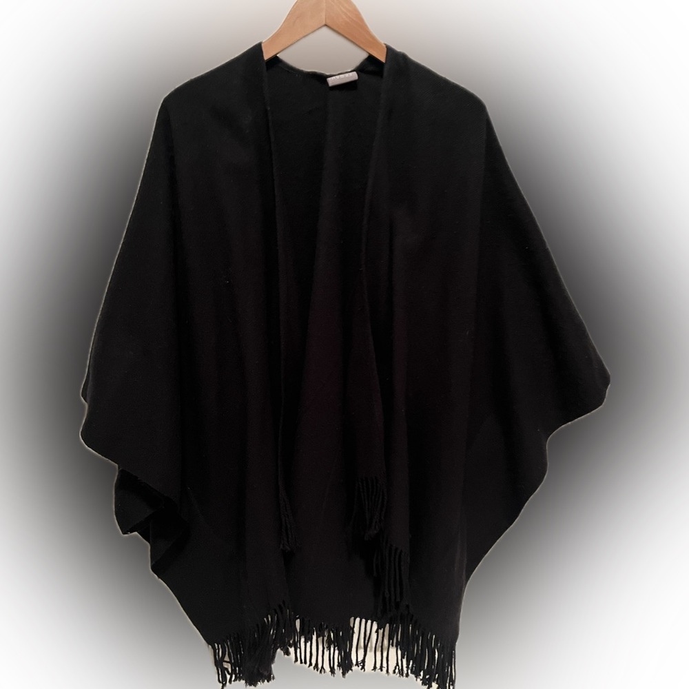 One size fits all. Warm cozy shawl.